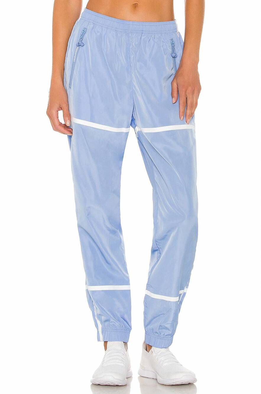 NEW ADAM SELMAN SPORT windbreaker taped track pants in powder blue